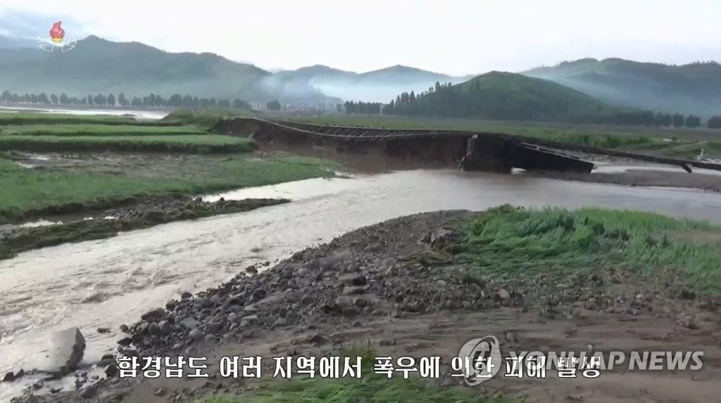 N.K. paper says current hardships from pandemic, flood damage as challenging as war