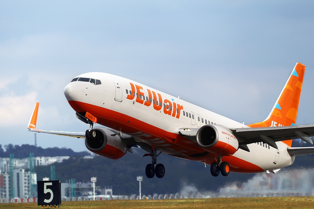 This undated file photo provided by Jeju Air Co. shows a passenger aircraft taking off from a South Korean airport. (PHOTO NOT FOR SALE) (Yonhap)