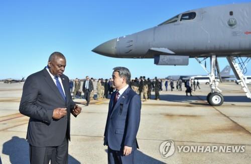 This file photo, released by South Korea's defense ministry on Nov. 3, 2022, shows Defense Minister Lee Jong-sup (R) speaking with his U.S. counterpart, Lloyd Austin, during their visit at Joint Base Andrews in Prince George's County, Maryland. (PHOTO NOT FOR SALE) (Yonhap)