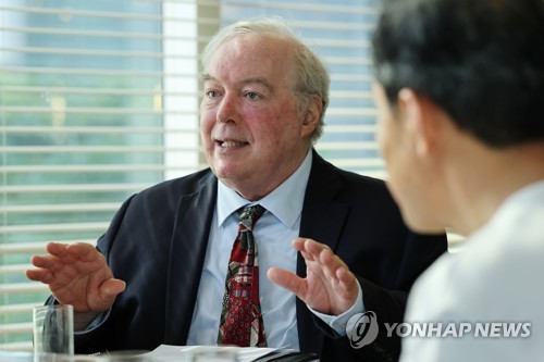 Paul Michael Taylor, director of the Asian Cultural History Program of the U.S. Smithsonian Institution's National Museum of Natural History, speaks during an interview with Yonhap News Agency at a Seoul hotel on May 23, 2023. (Yonhap)