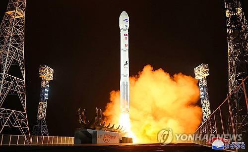 This file photo, carried by North Korea&apos;s official Korean Central News Agency on Nov. 22, 2023, shows the North launching a military spy satellite, called the Malligyong-1, on a new type of Chollima-1 rocket the previous day. (For Use Only in the Republic of Korea. No Redistribution) (Yonhap)