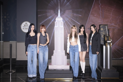 K-pop girl group Le Sserafim attends a lighting ceremony for the Empire State Building on Sept. 10, 2024, in this photo provided by Source Music. (PHOTO NOT FOR SALE) (Yonhap)