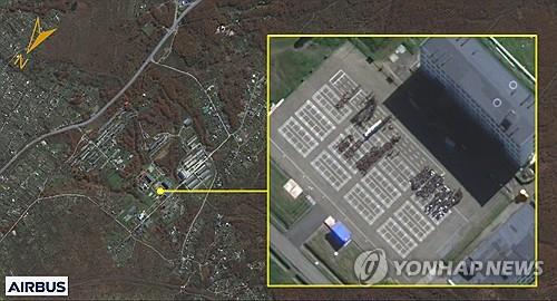 This photo, provided by the South Korean National Intelligence Service on Oct. 18, 2024, shows recent satellite imagery of North Korean soldiers gathering at a Russian military facility. (PHOTO NOT FOR SALE) (Yonhap)