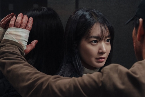 A still, provided by Netflix, shows Ju-yeon, played by Shin Min-a, from the streaming platform's Korean original series "Karma." (PHOTO NOT FOR SALE) (Yonhap)