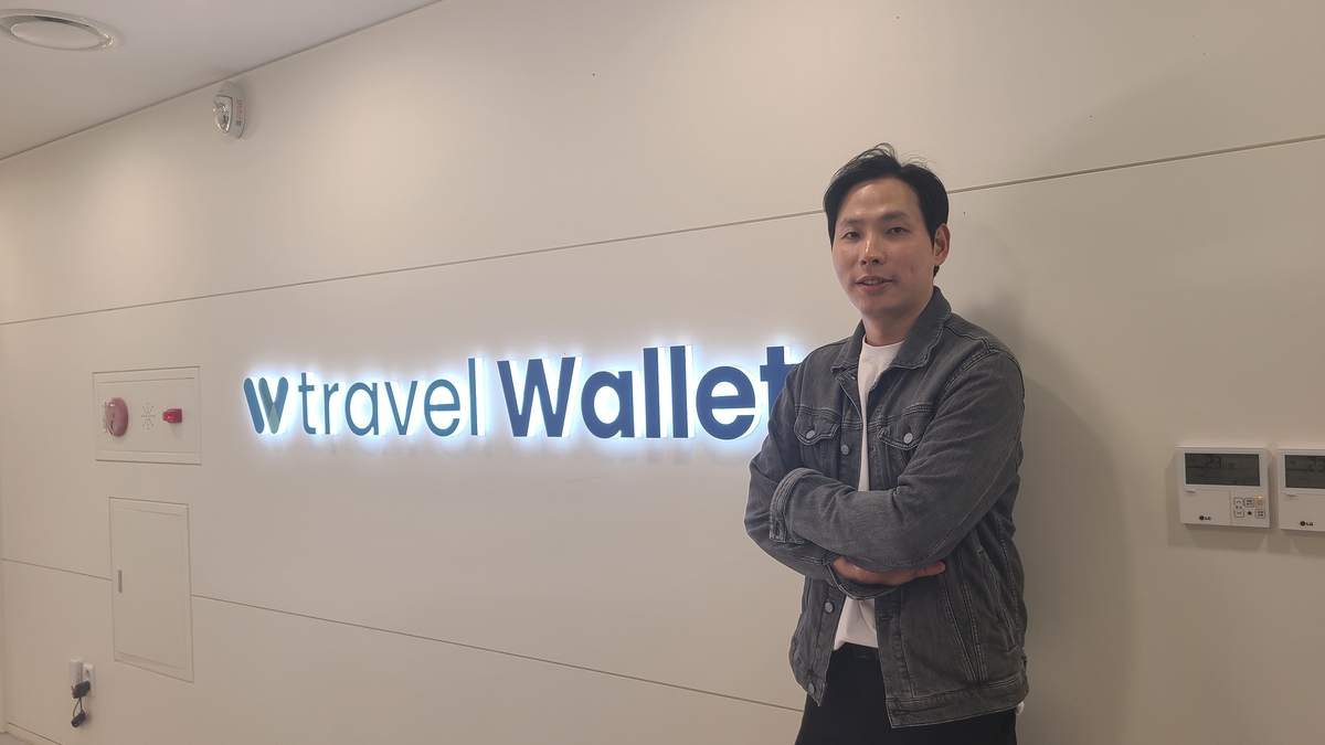 Kim Hyung-woo, the founder and CEO of South Korean fintech startup Travel Wallet, poses for a photo at the company's office in southern Seoul on Dec. 3, 2025. (Yonhap)