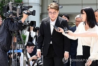 Le chanteur Kim Ho-joong «sincèrement désolé» avant son audience en vue d'un possible mandat d'arrêt