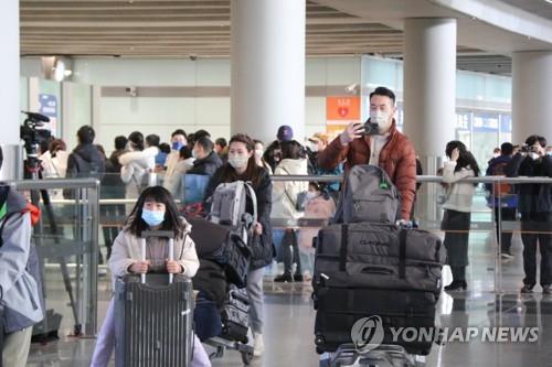 中国・北京の空港に到着した旅行客ら（資料写真）＝（聯合ニュース）