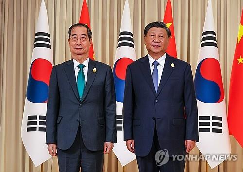 韓国首相　北朝鮮問題で中国の役割期待＝習主席「韓日中首脳会談の開催歓迎」