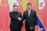 (2ª AMPLIACIÓN) Xi llega a Pyongyang para la cumbre con Kim