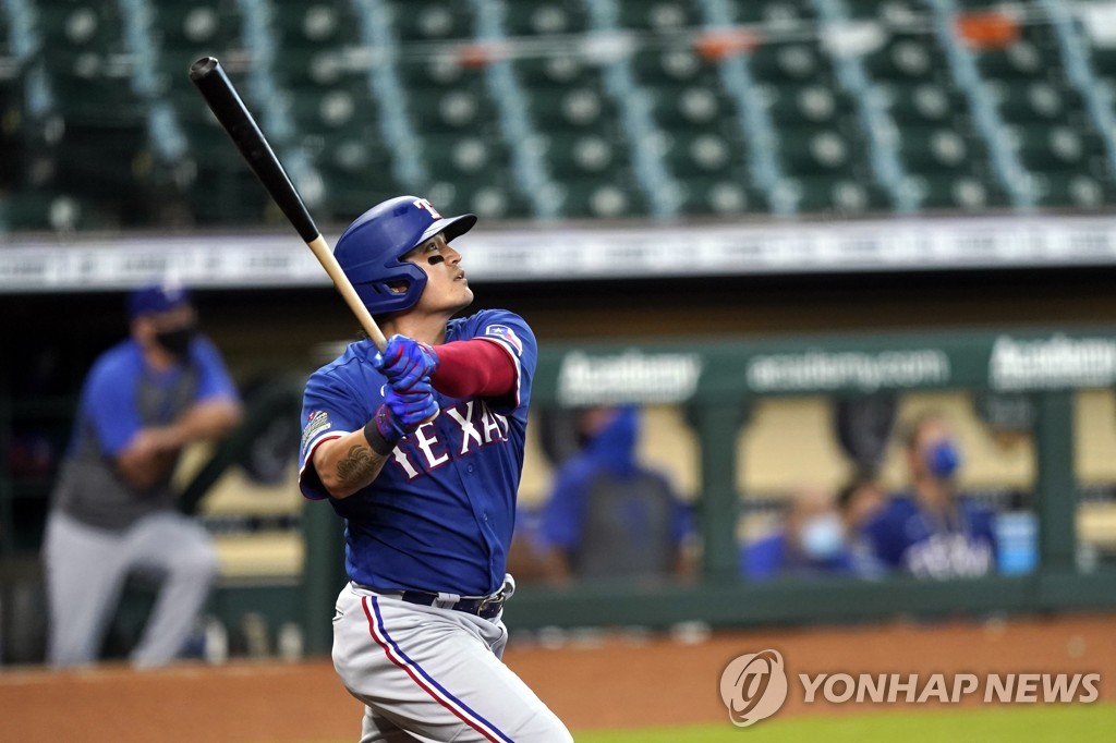 In this Associated Press photo, Choo Shin-soo of the Texas Rangers watches his home run against the Houston Astros in a Major League Baseball regular season game at Minute Maid Park in Houston on Sept. 3, 2020. (Yonhap)
