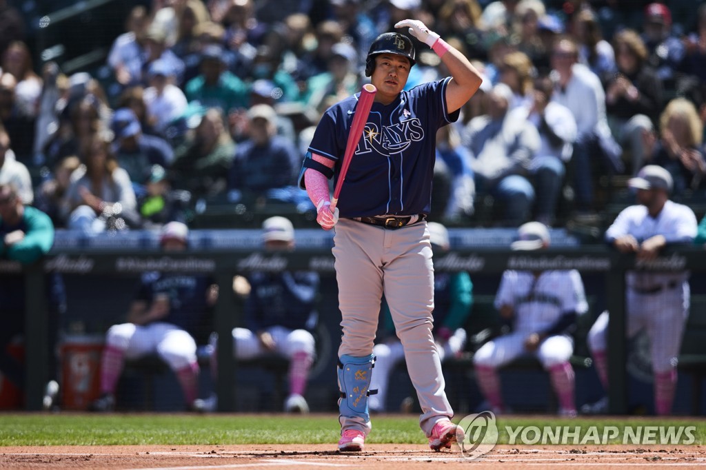In this Associated Press photo, Choi Ji-man of the Tampa Bay Rays reacts after striking out against Seattle Mariners starter George Kirby during the top of the first inning of a Major League Baseball regular season game at T-Mobile Park in Seattle on May 8, 2022. (Yonhap)