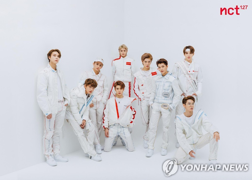K-pop band NCT 127 pose in this photo provided by SM Entertainment. (Yonhap)