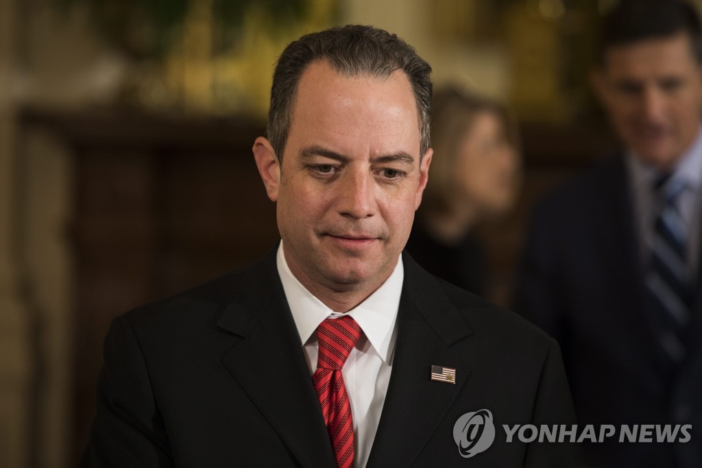 Then White House Chief of Staff Reince Priebus enters a joint press conference with U.S. President Donald Trump and British Prime Minister Theresa May at the White House in Washington on Jan. 27, 2017, in this photo released by EPA. (Yonhap)