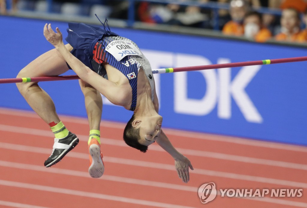 In this EPA file photo from March 20, 2022, Woo Sang-hyeok of South Korea competes in the men's high jump final at the World Athletics Indoor Championships at Stark Arena in Belgrade. (Yonhap)