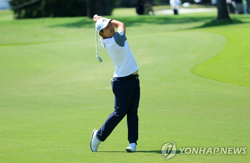 In this Getty Images photo, Lee Kyoung-hoon of South Korea plays his second shot on the 12th hole during the final round of the AT&T Byron Nelson at TPC Craig Ranch in McKinney, Texas, on May 15, 2022. (Yonhap)