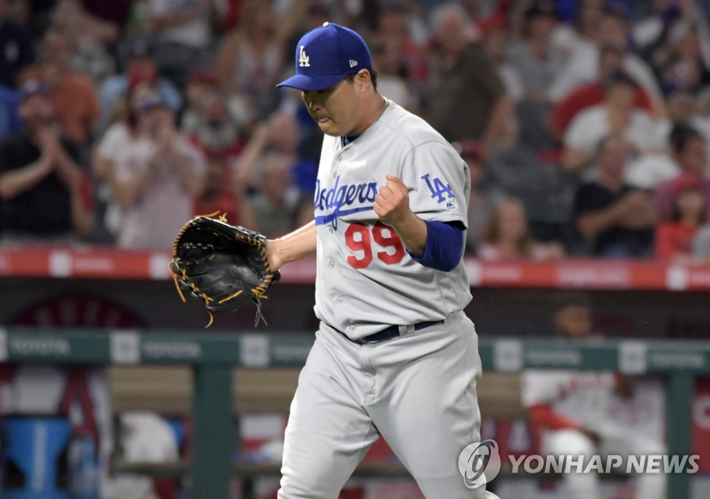 In this Reuters photo via USA Today Sports, Ryu Hyun-jin of the Los Angeles Dodgers reacts after striking out Mike Trout of the Los Angeles Angels in the bottom of the fifth inning of a Major League Baseball regular season game at Angel Stadium in Anaheim, California, on June 10, 2019. (PHOTO NOT FOR SALE) (Yonhap)