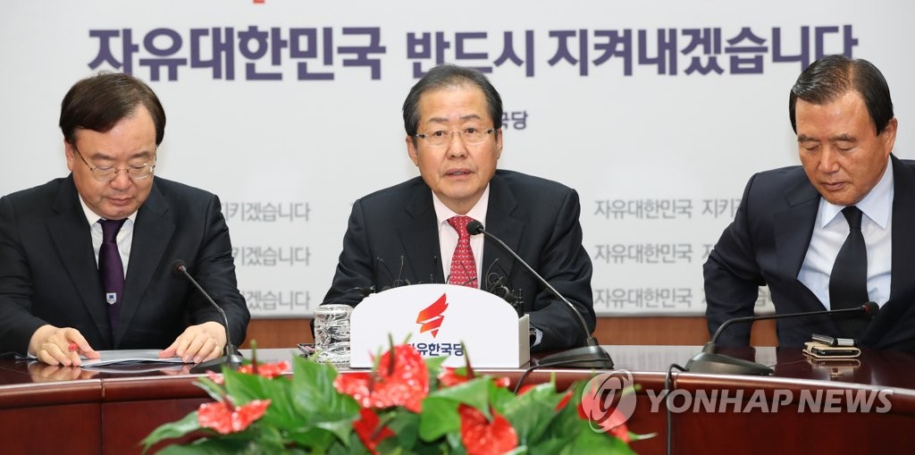 박 전 대통령 제명 밝히는 홍준표 대표