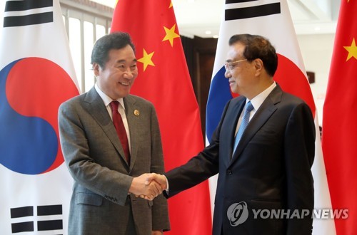 Corea del Sur y China discuten el tema del polvo fino en los diálogos entre sus primeros ministros