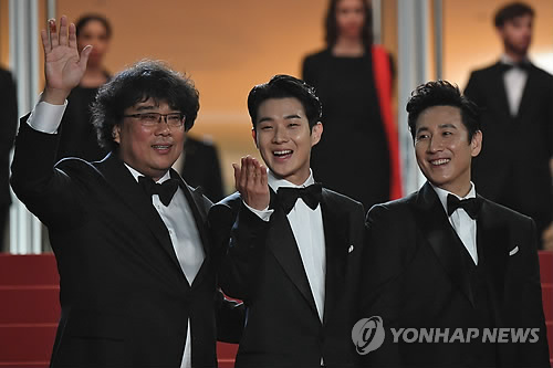 Actor Choi Woo Shik, director Bong Joon-Ho and actor Song Kang-Ho