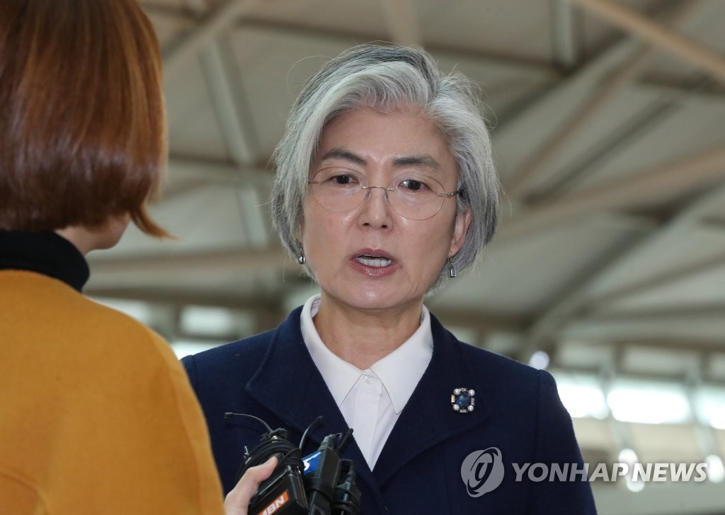 Foreign Minister Kang Kyung-wha speaks to reporters at Incheon International Airport, west of Seoul, on Feb. 13, 2020, before departing for Munich, Germany, to attend a multilateral security conference. (Yonhap) 