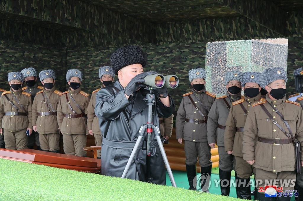 North Korean leader Kim Jong-un (front) watches a joint strike drill on Feb. 28, 2020, in this photo released by the North's official Korean Central News Agency the next day. The report did not provide details on what was tested and where the firing drill was conducted. (For Use Only in the Republic of Korea. No Redistribution) (Yonhap)