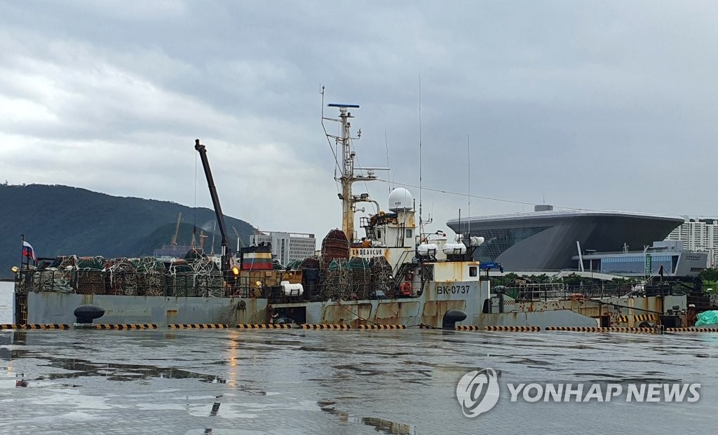 This photo, taken July 30, 2020, shows a Russia-flagged ship docked in a cruise terminal in the southeastern city of Busan after one of its sailors tested positive for the new coronavirus. (Yonhap)