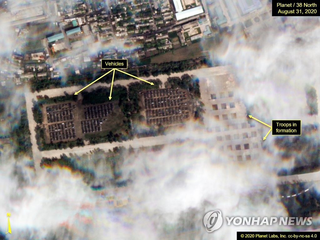 This photo taken on Sept. 20, 2020 and downloaded from the website 38 North website shows various vehicles grouped around the replica of Kim Il-sung Square in Pyongyang. (PHOTO NOT FOR SALE) (Yonhap)