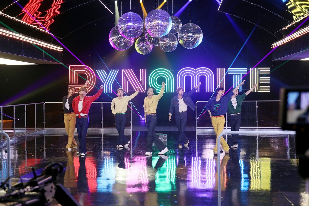 This photo, provided by Big Hit Entertainment on Oct. 3, 2020, shows K-pop group BTS singing "Dynamite," its latest Billboard Hot 100 No. 1 hit, for the "BTS Week" special on NBC's "The Tonight Show Starring Jimmy Fallon" in the United States. (PHOTO NOT FOR SALE) (Yonhap)