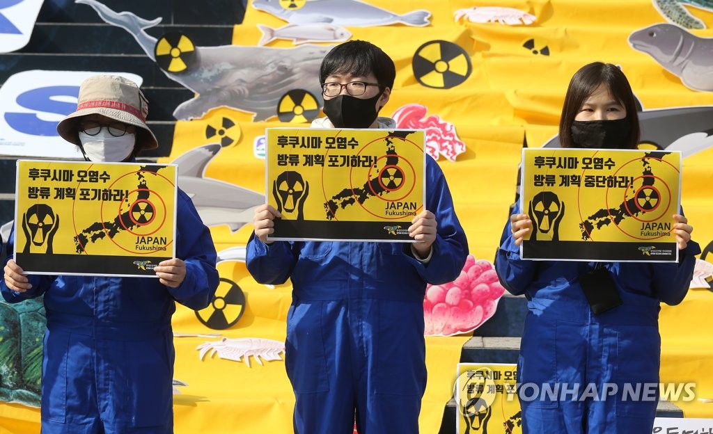 Members of an environmental activist group, the Korean Federation for Environmental Movement, stage a rally in Seoul on Oct. 26, 2020, to call on the Japanese government to retract its plan to release water containing radioactive materials stored at the Fukushima nuclear power plant in Japan. The plant has been crippled since the March 2011 earthquake and tsunami. (Yonhap)