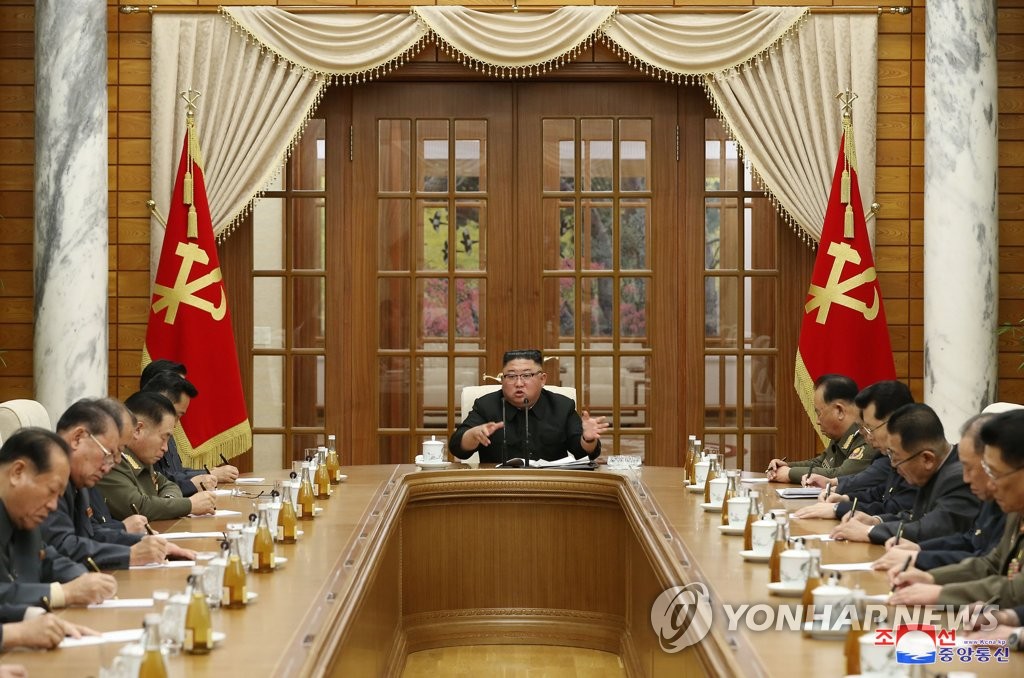 North Korean leader Kim Jong-un (C) presides over a politburo meeting of the Workers' Party and discusses preparation for an upcoming rare party meeting, in this photo provided by the Korean Central News Agency on Nov. 30, 2020. (For Use Only in the Republic of Korea. No Redistribution) (Yonhap) 