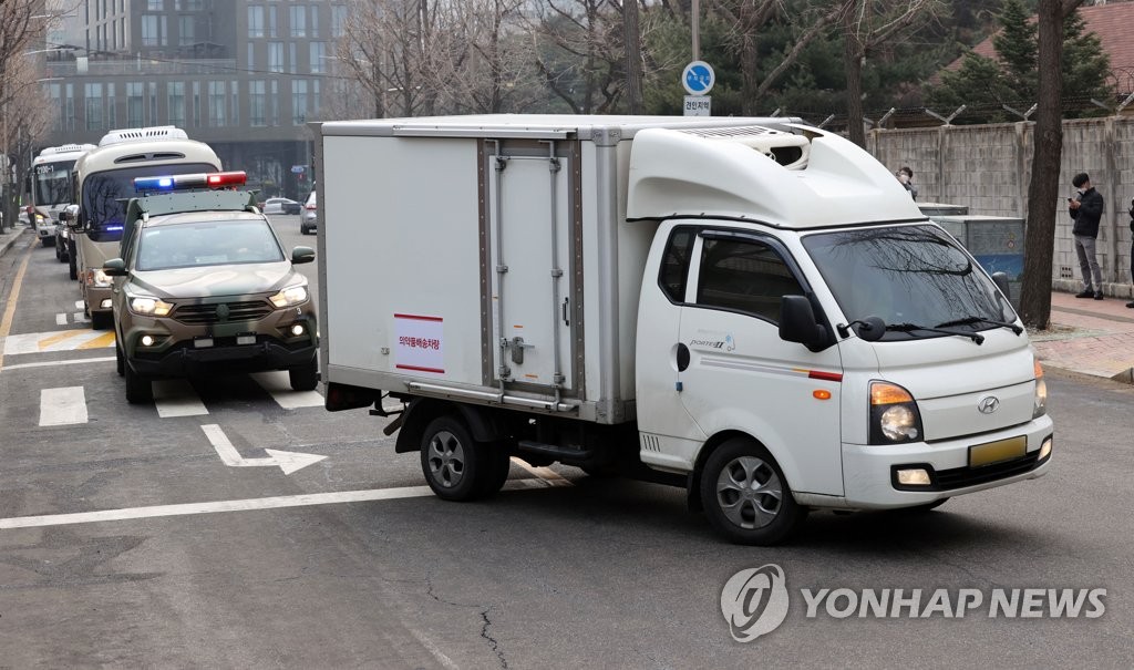 This photo taken Feb. 1, 2021, shows vehicles in a training simulation for the delivery of coronavirus vaccines at a Seoul medical center. (Yonhap)