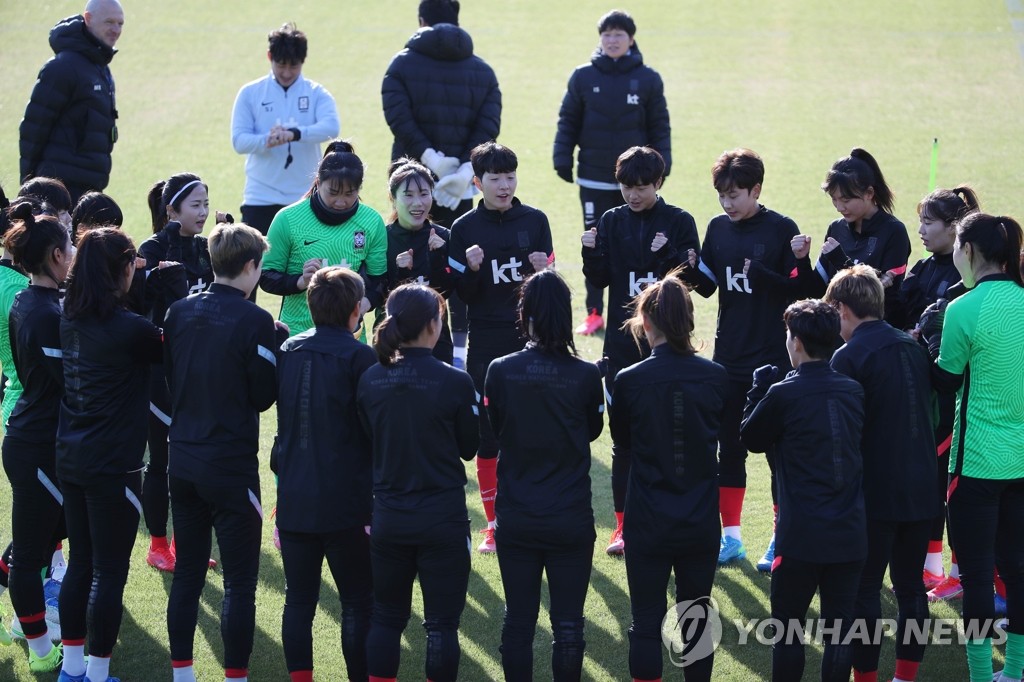 In this file photo from March 22, 2021, South Korean women&apos;s national football team players prepare for practice at the National Football Center in Paju, Gyeonggi Province, in preparation for Olympic qualifying playoff matches against China. (Yonhap)
