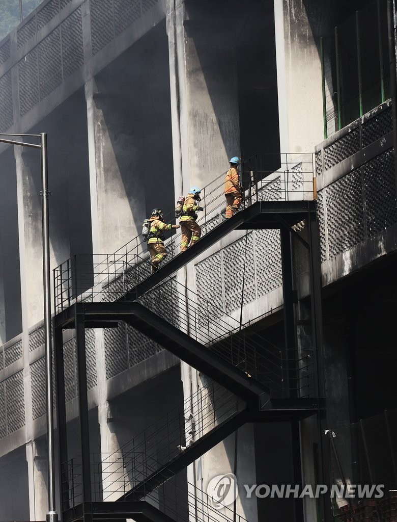 Firefighters at Coupang warehouse