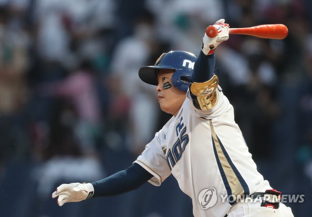 In this file photo from June 27, 2021, Kwon Hui-dong of the NC Dinos hits a single against the SSG Landers in the bottom of the seventh inning of a Korea Baseball Organization regular season game at Changwon NC Park in Changwon, 400 kilometers southeast of Seoul. (Yonhap)