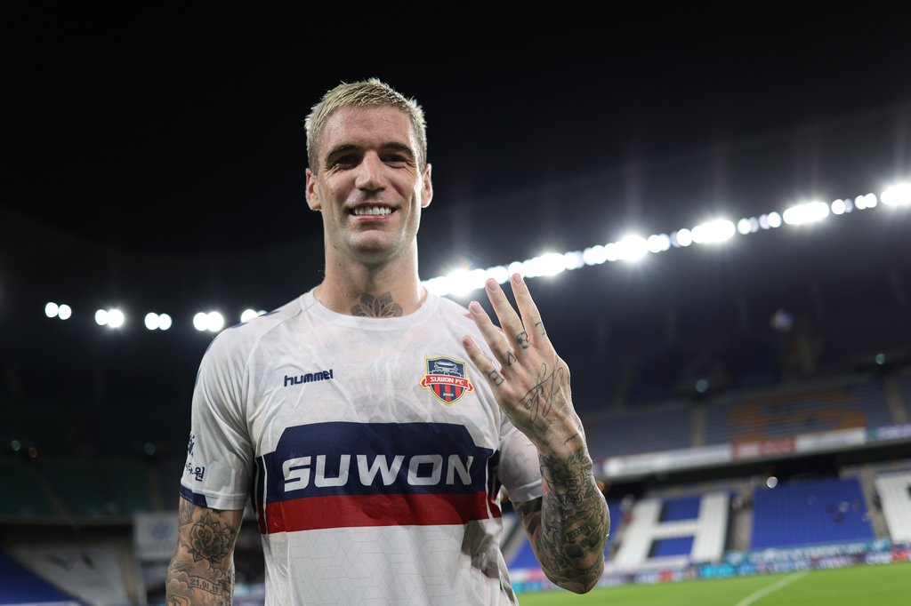 In this July 25, 2021, file photo provided by the Korea Professional Football League, Lars Veldwijk of Suwon FC celebrates his four-goal performance against Ulsan Hyundai FC in a K League 1 match at Munsu Football Stadium in Ulsan, 415 kilometers southeast of Seoul. (PHOTO NOT FOR SALE) (Yonhap)