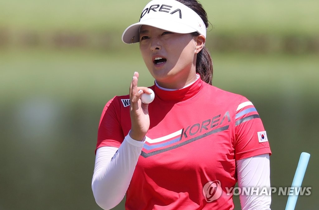Ko Jin-young of South Korea walks off the 18th green after completing the first round of the Tokyo Olympic women's golf tournament at Kasumigaseki Country Club in Saitama, Japan, on Aug. 4, 2021. (Yonhap)