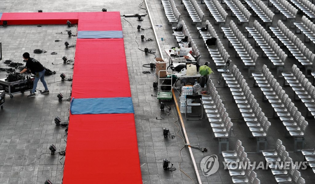 This photo taken on Oct. 5, 2021, shows workers preparing for the 26th Busan International Film Festival (BIFF) due to open in the southern port city of Busan, 453 kilometers south of Seoul, on Wednesday for a 10-day run with a bigger emphasis on offline events and screenings after a pandemic-disrupted year. (Yonhap)