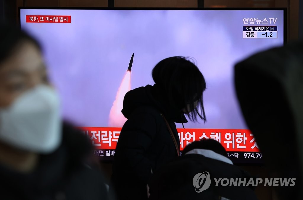 A TV report is aired at Seoul Station on Jan. 11, 2022, on North Korea's firing of a suspected ballistic missile toward the East Sea earlier in the day. It marked the North's second projectile launch in less than a week. (Yonhap)