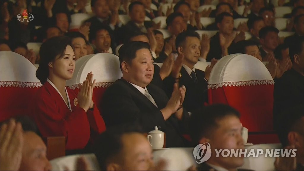 North Korean leader Kim Jong-un (2nd from L), his wife Ri Sol-ju (L) and other senior officials attend an art performance at the Mansudae Art Theater in Pyongyang on Feb. 1, 2022, in this photo captured from a broadcast released the following day by the North's official Korean Central Television. (For Use Only in the Republic of Korea. No Redistribution) (Yonhap) 