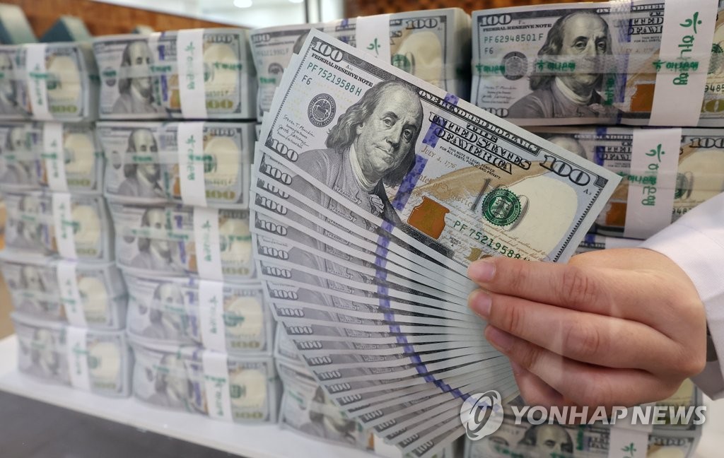(جديد) انخفاض العملة الكورية لأدنى مستوى في 13 عاما أمام الدولار في ظل الركود العالمي - 2