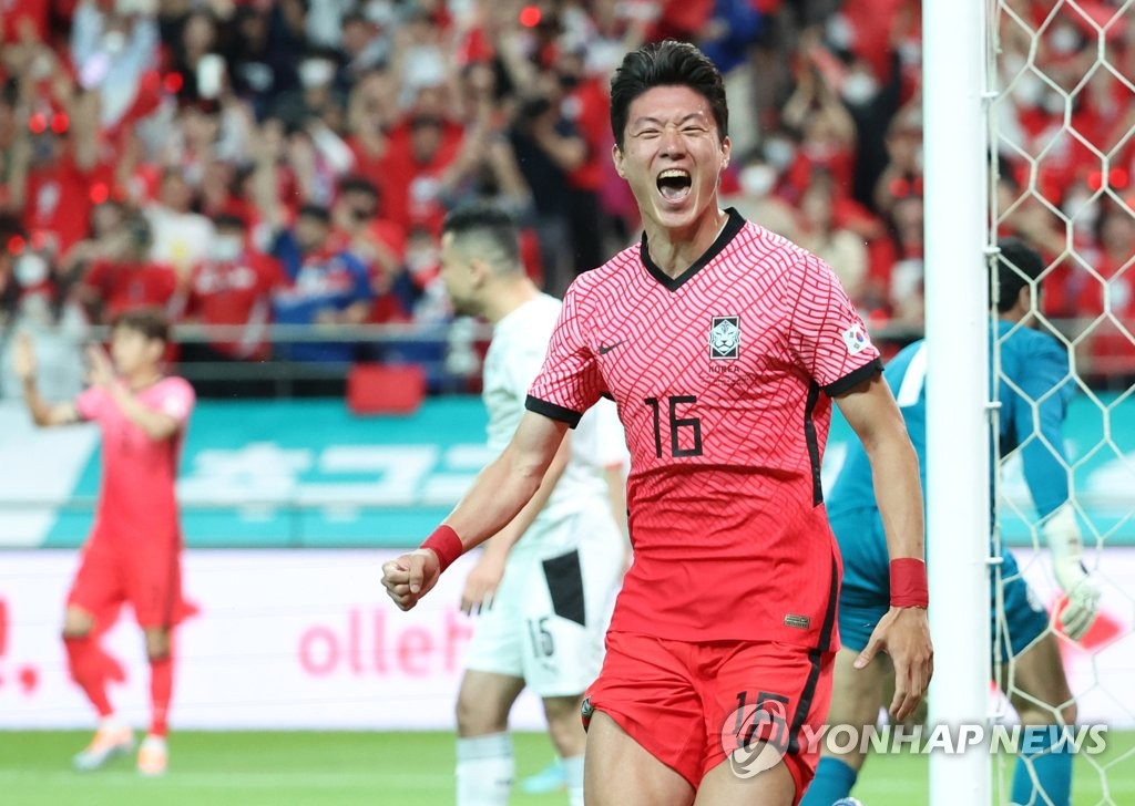 Hwang Ui-jo of South Korea celebrates after scoring a goal against Egypt during the countries' friendly football match at Seoul World Cup Stadium in Seoul on June 14, 2022. (Yonhap)