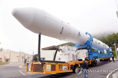 This photo provided by the Korea Aerospace Research Institute on June 20, 2022, shows South Korean space rocket Nuri being transported to the launch pad at Naro Space Center in Goheung, some 470 kilometers south of Seoul. (PHOTO NOT FOR SALE) (Yonhap)