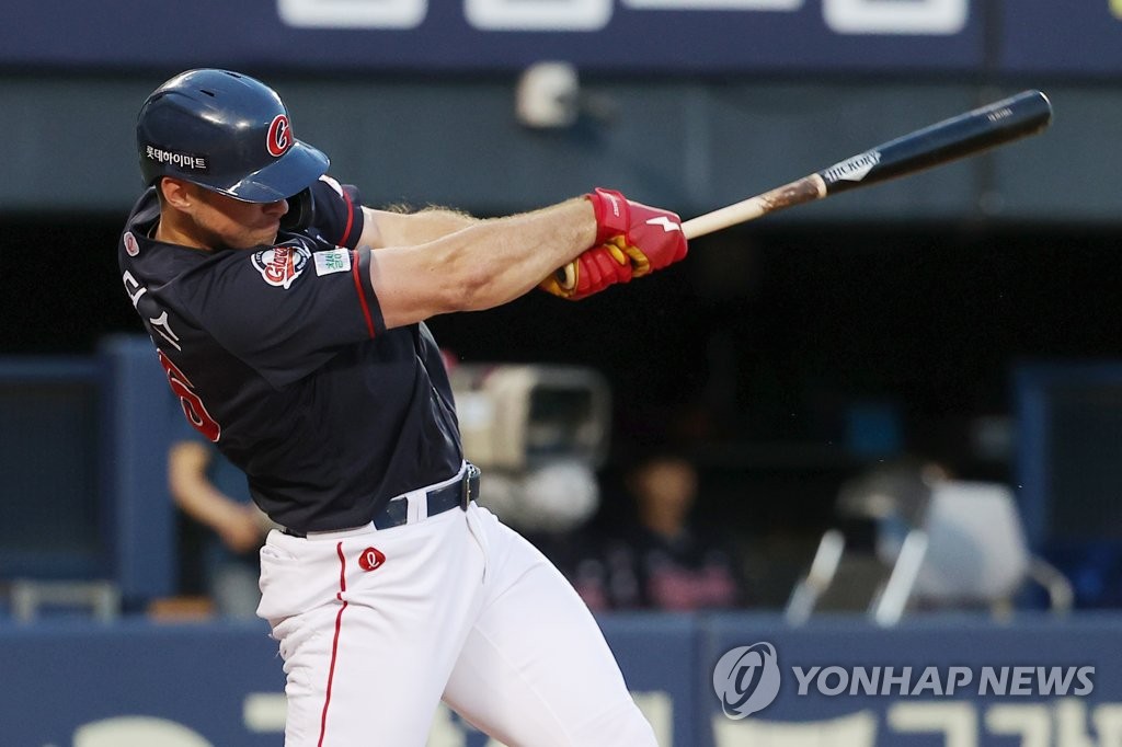 In this file photo from July 1, 2022, DJ Peters of the Lotte Giants hits a double against the LG Twins during the top of the fourth inning of a Korea Baseball Organization regular season game at Jamsil Baseball Stadium in Seoul. (Yonhap)