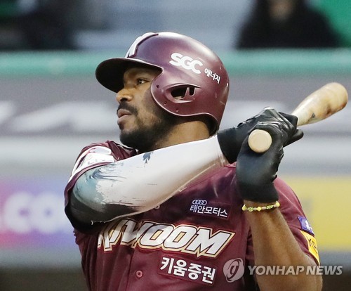 In this file photo from July 14, 2022, Yasiel Puig of the Kiwoom Heroes picks up a base hit against the SSG Landers during the top of the sixth inning of a Korea Baseball Organization regular season game at Incheon SSG Landers Field in Incheon, 30 kilometers west of Seoul. (Yonhap)