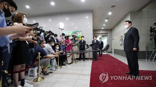 Yoon vows to uphold people's will upon returning from vacation