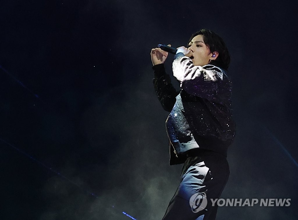 BTS member Jungkook performs during the opening ceremony for the 2022 FIFA World Cup at Al Bayt Stadium in Al Khor, north of Doha, on Nov. 20, 2022. (Yonhap)