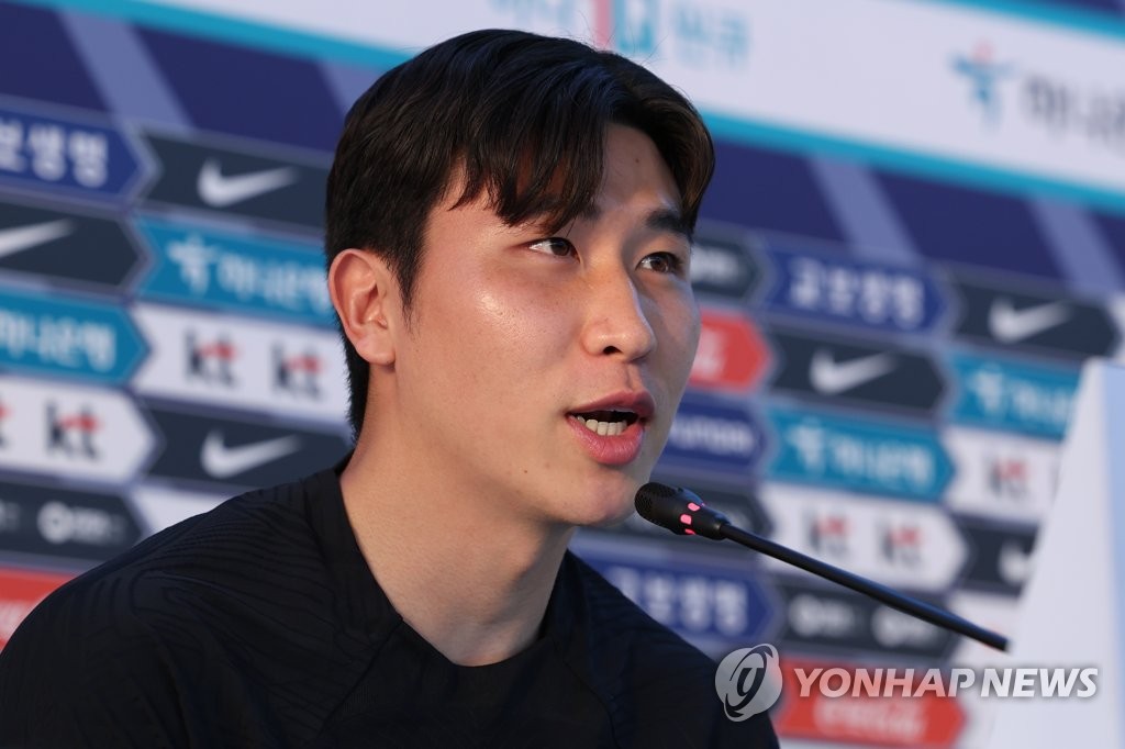 South Korean defender Yoon Jong-gyu speaks at a press conference before a training session for the FIFA World Cup at Al Egla Training Site in Doha on Nov. 26, 2022. (Yonhap)