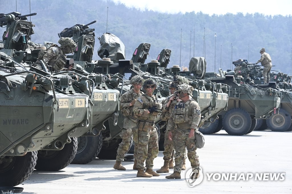 U.S. troops employing Stryker armored vehicles get ready to take part in combined drills with South Korean forces at the Rodriguez Live Fire Complex in Pocheon, 41 kilometers north of Seoul, on March 22, 2023. (Pool photo) (Yonhap)