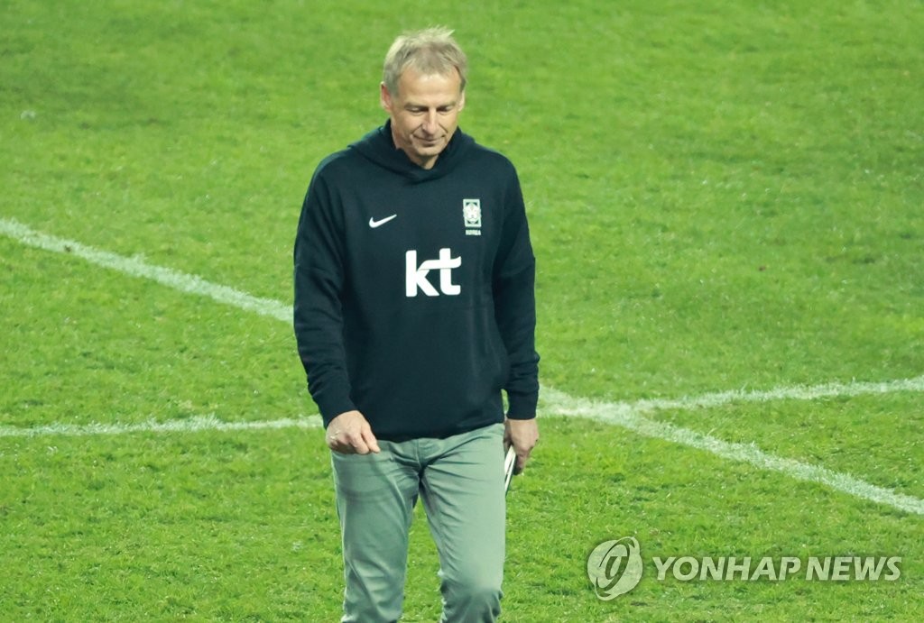 South Korean head coach Jurgen Klinsmann walks off the pitch at Seoul World Cup Stadium in Seoul after a 2-1 loss to Uruguay in a friendly football match on March 28, 2023. (Yonhap)