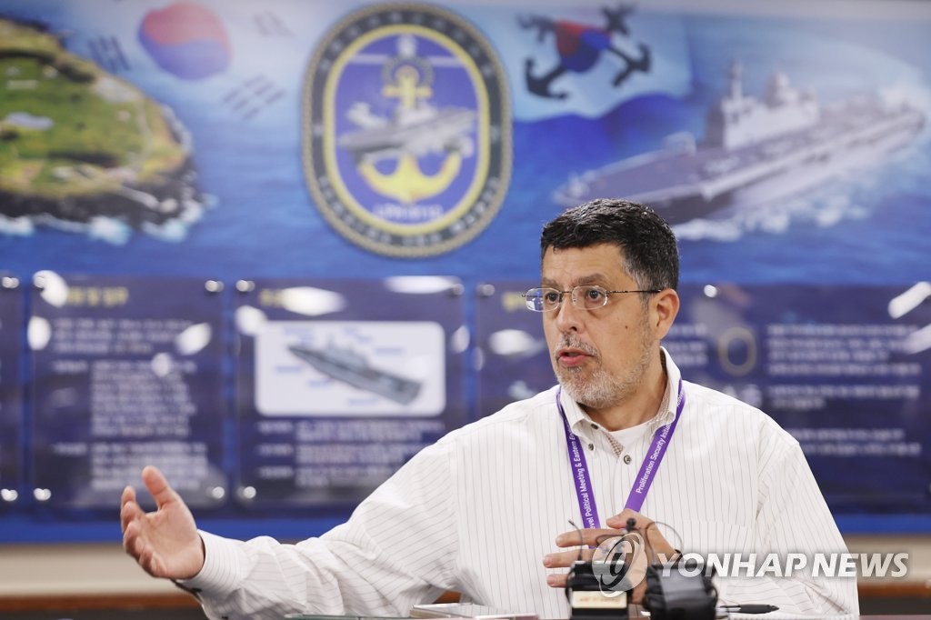 Gonzalo Suarez, a U.S. deputy assistant secretary of state for international security and nonproliferation, speaks during an interview with reporters while observing a maritime drill to crack down on ships suspected of carrying weapons of mass destruction aboard the South Korean Navy's Marado, a 14,500-ton amphibious assault ship, on seas off South Korea's southern Jeju Island on May 31, 2023. (Yonhap)